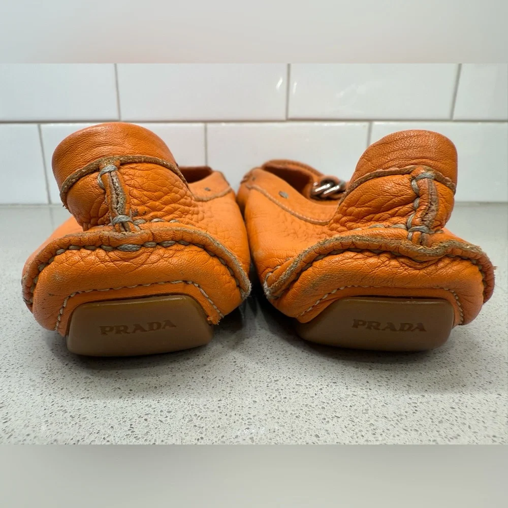 Prada Orange Leather Driving Loafers with Buckle Detail